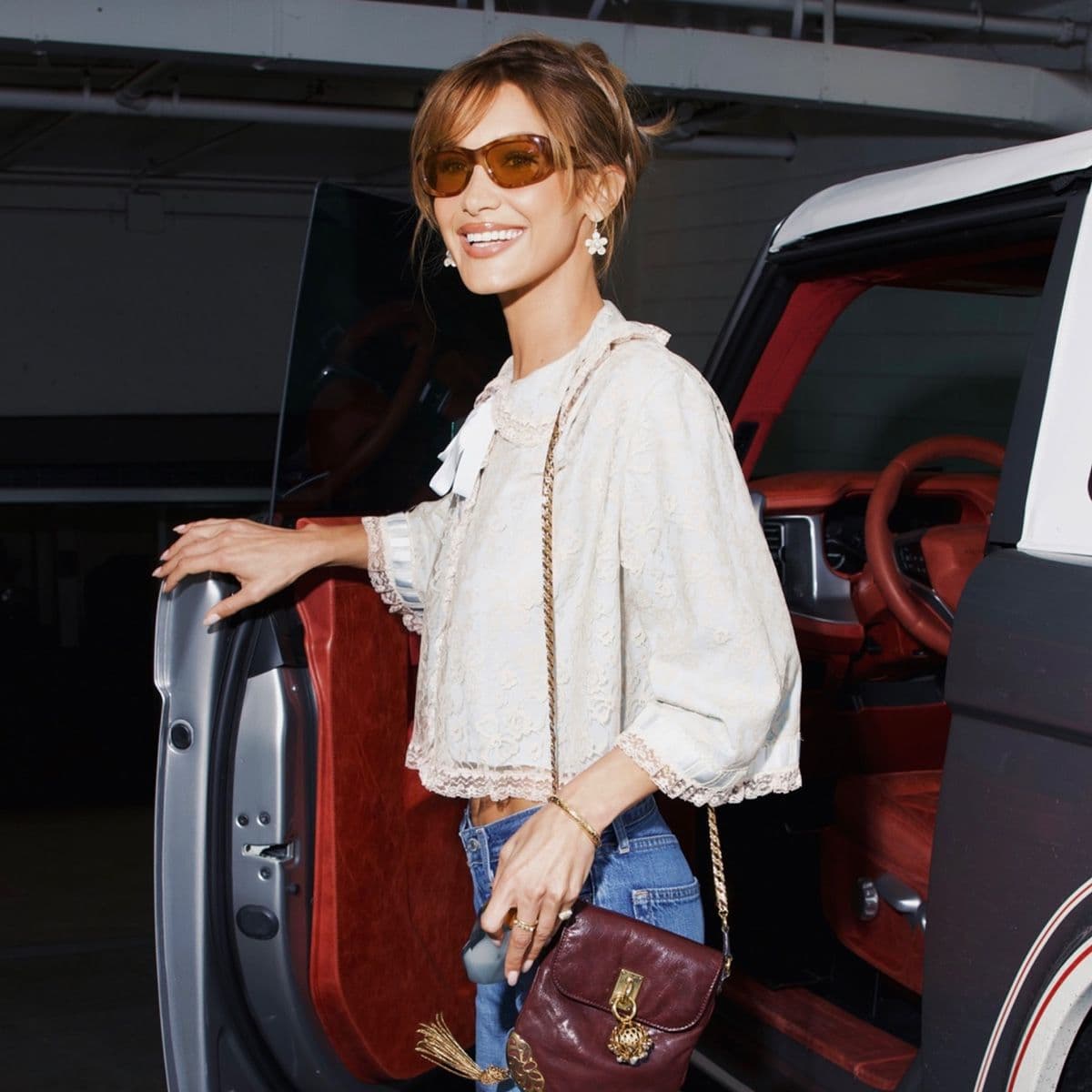  If You're Going to Wear Trendy Bootcut Jeans, This Shirt Style and Heel Style Are the Most Effective Pairings 